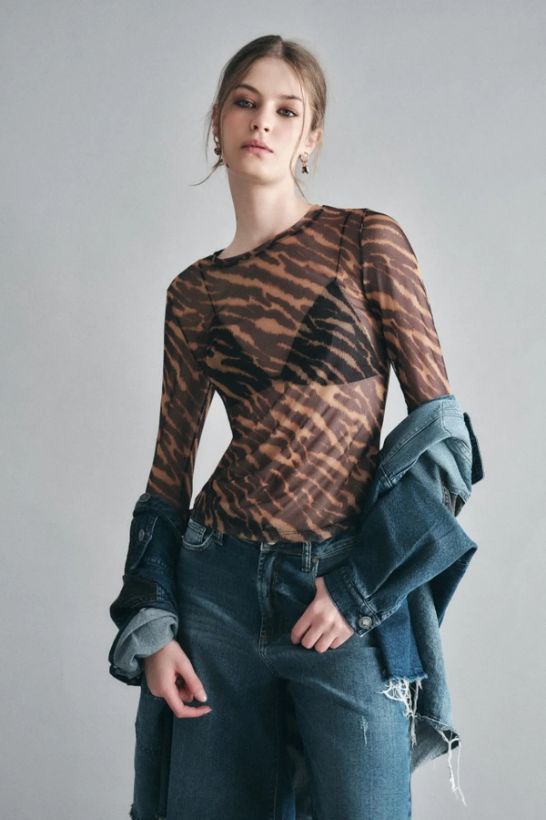 polera mesh animal cebra