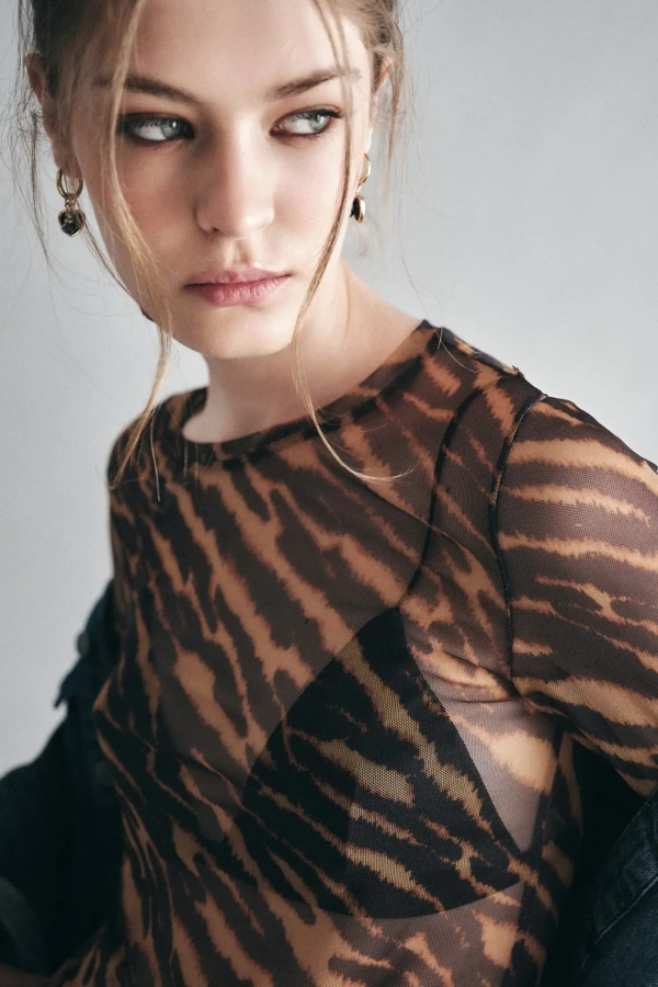 polera mesh animal cebra
