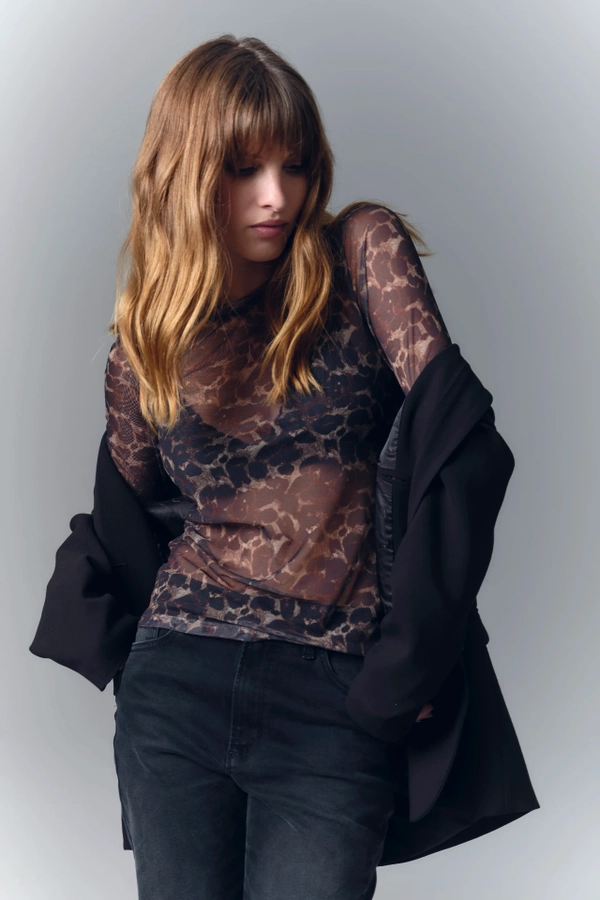 polera mesh animal leopardo
